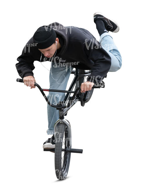 young man doing stunts on a bmx bike