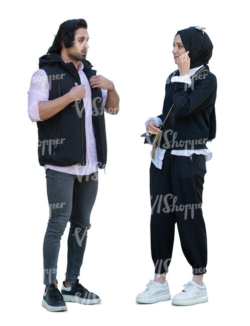 young muslim woman with a hijab talking to a man