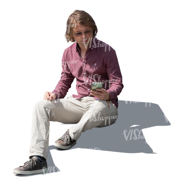 cut out man sitting on the stairs with a phone in his hand