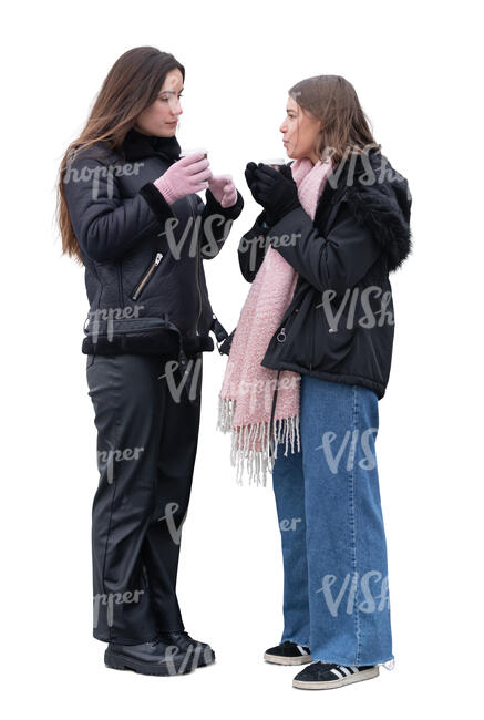 two cut out young women standing and drinking hot drinks