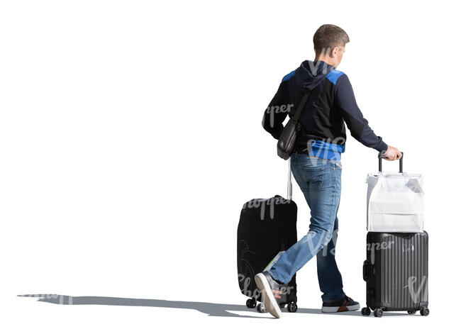 man with two big suitcases walking in the street