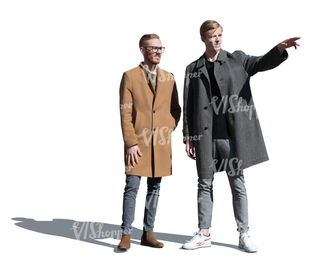two men in autumn standing and pointing at smth