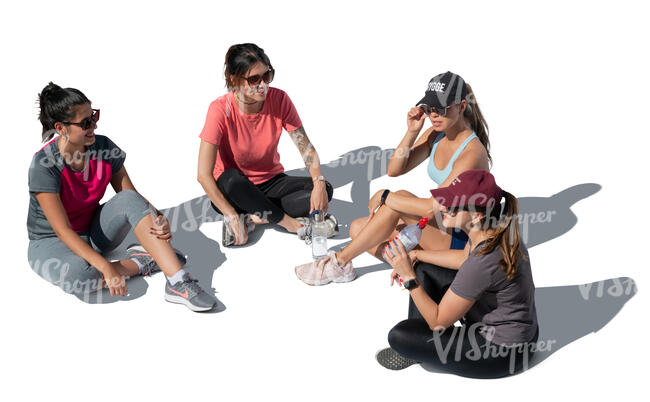 group of women sitting on the ground seen from top angle