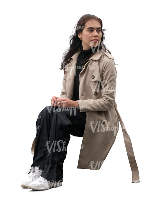 cut out mexican woman with an overcoat sitting