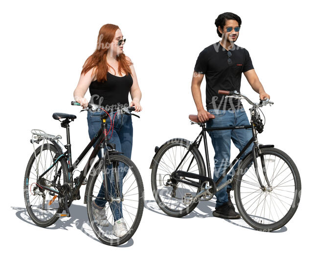 man and woman with bikes walking side by side