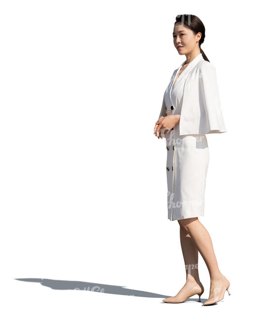 asian woman in a white dress standing