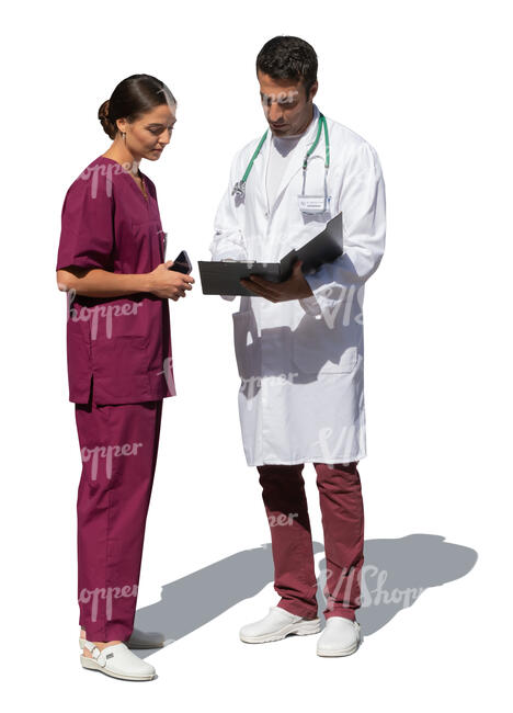 two medical workers standing outside and talking