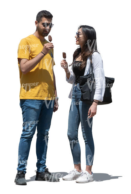 man and woman standing and eating ice cream