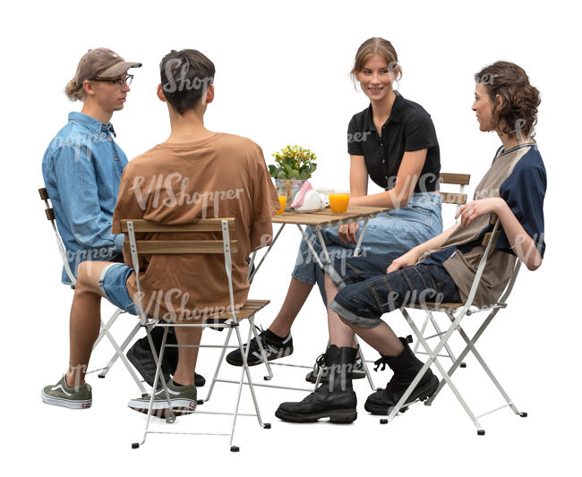 group of four young people sitting in a restaurant and talking