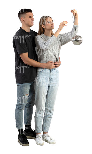 cut out couple decorating a christmas tree