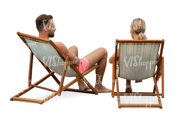 man and woman relaxing in the beach chairs and talking