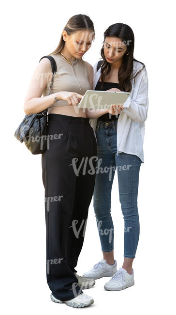 two women with a tablet standing and talking