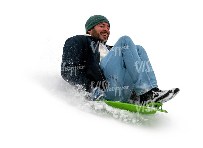 cut out man sledding down the hill