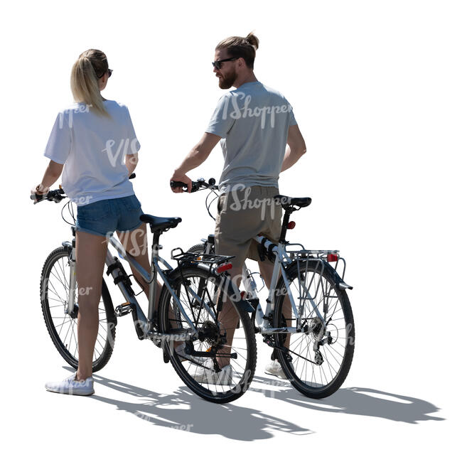cut out backlit man and woman on bikes stopping to talk 