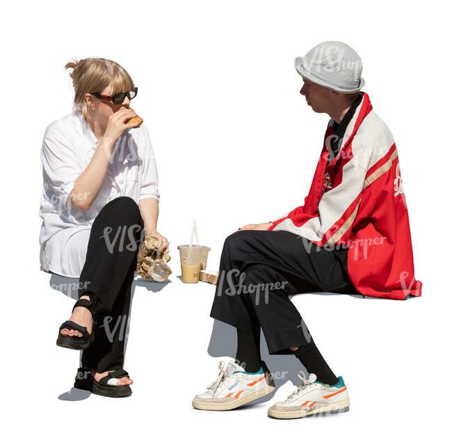 man and woman sitting outside and eating their lunch