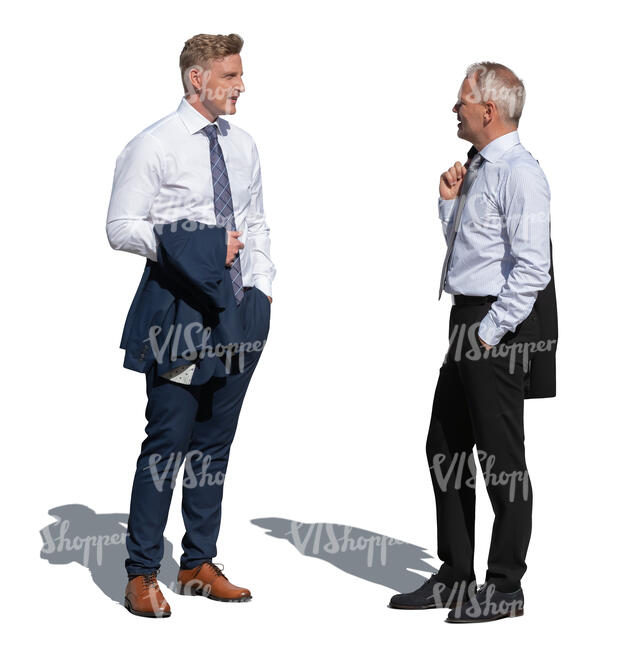 two businessmen standing in sunlight and talking