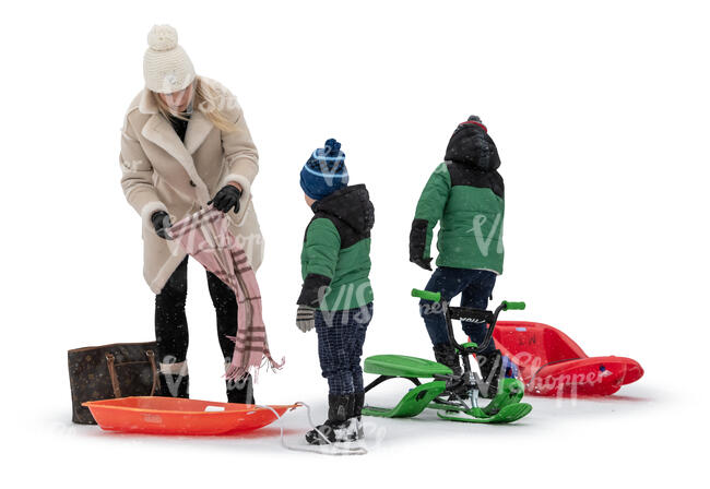 family with two kids going sledging