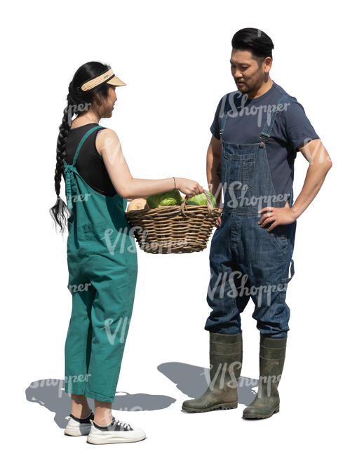 two asian people standing in the garden with vegetable basket and talking