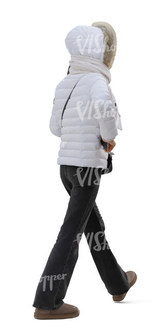 woman in a white winter jacket walking