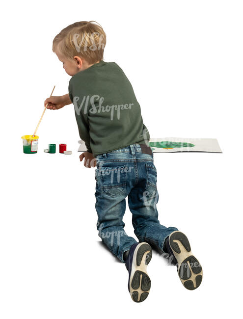 little boy painting a picture