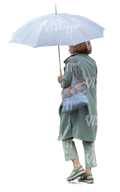 woman with an umbrella walking in the rain