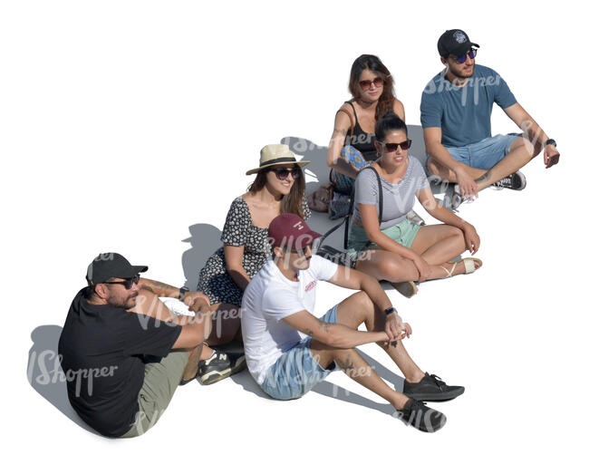 group of friends sitting on the ground seen from above