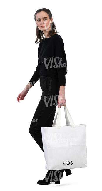 woman with a big white bag walking