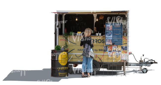 woman buying food from a food truck