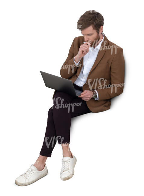 man with a laptop sitting on a sofa seen from a above