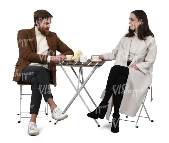 man and woman sitting in a cafe and talking