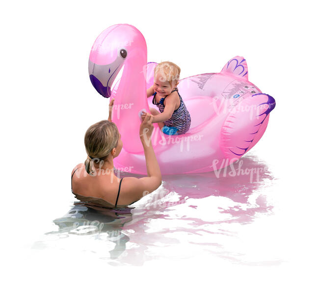 mother and her baby daughter swimming with a big pink flamingo