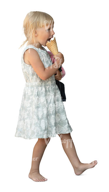 little girl walking and eating an ice cream