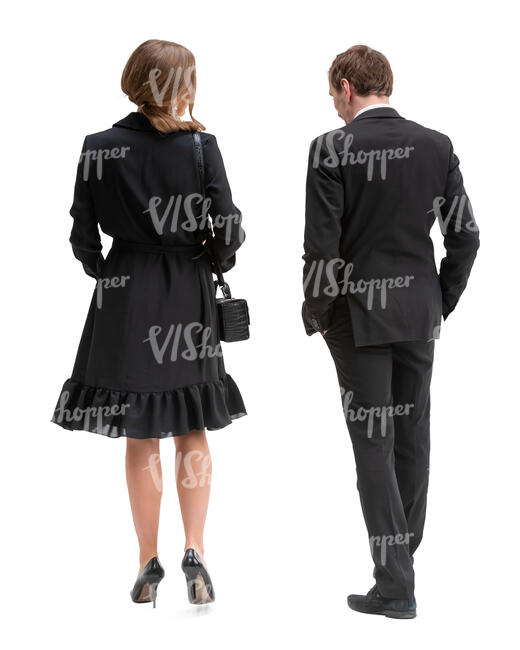 man and woman in formal party clothes walking