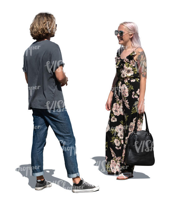 man and woman standing outside and talking