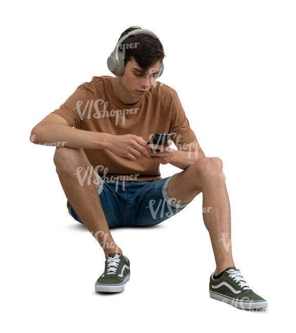 man sitting and listening to music