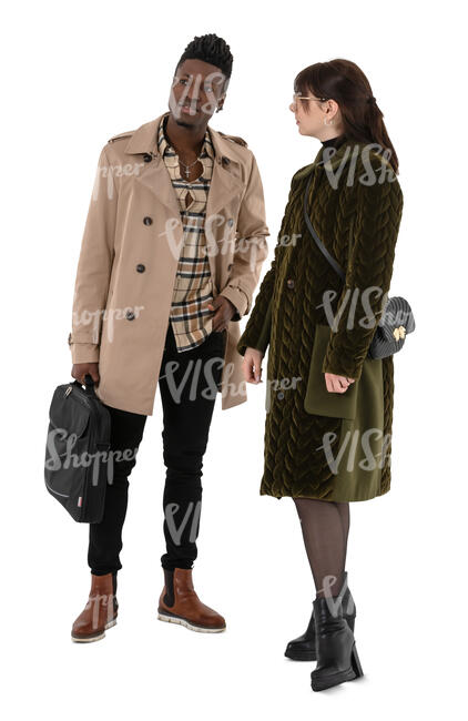 two people wearing light overcoats standing