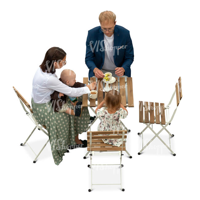 family with kis sitting in a restaurant seen from above