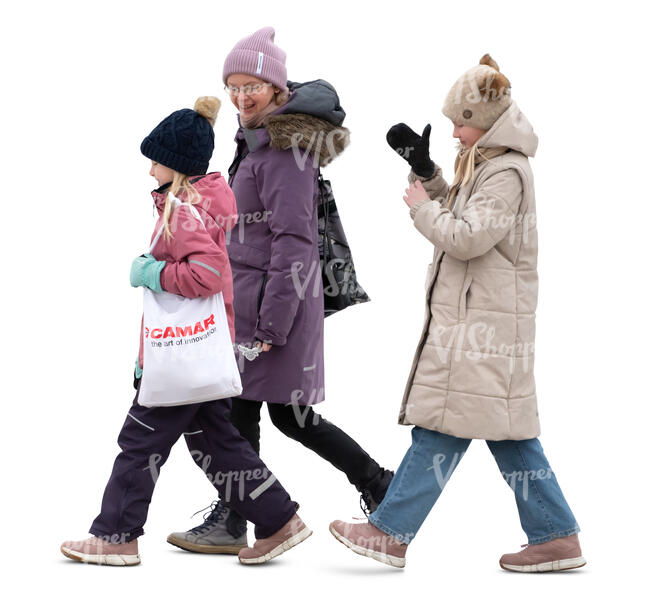 woman and two kids walking in winter