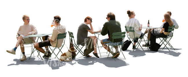 backlit outdoor cafe scene with people sitting and talking