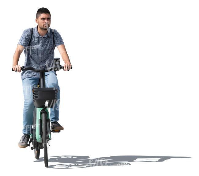 sidelit man riding a bike