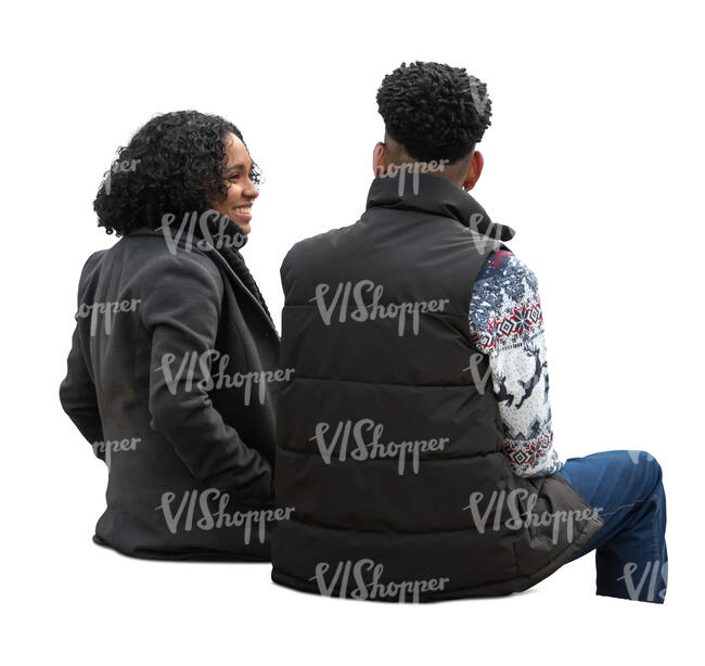 man and woman sitting and talking