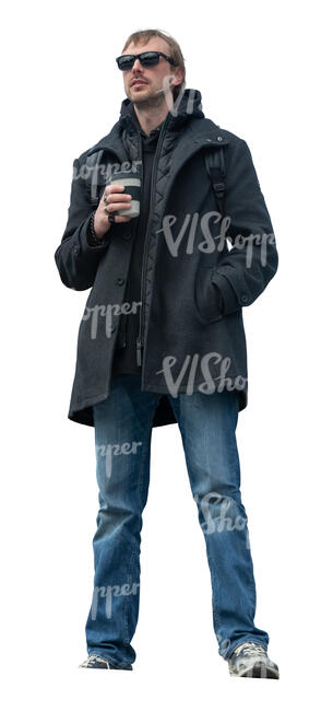 man with a coffee cup standing seen from below