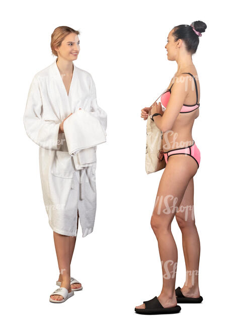two women in a spa in bathing suits standing and talking