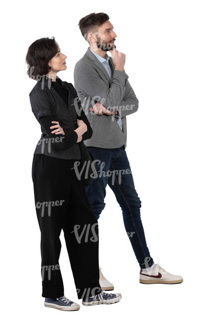 man and woman standing in a museum and talking