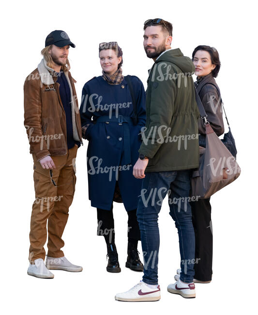 group of four people standing outside