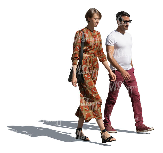 man and woman walking in sunlight