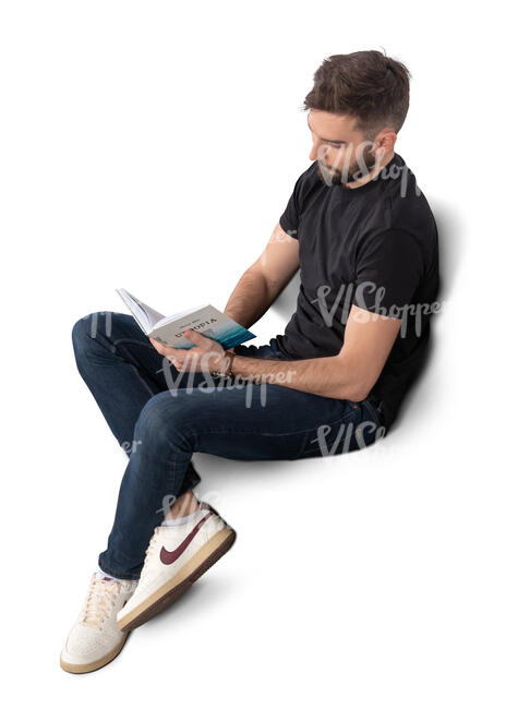 man sitting and reading a book seen from above