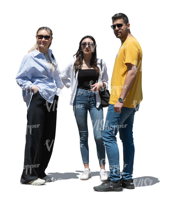 group of three people standing