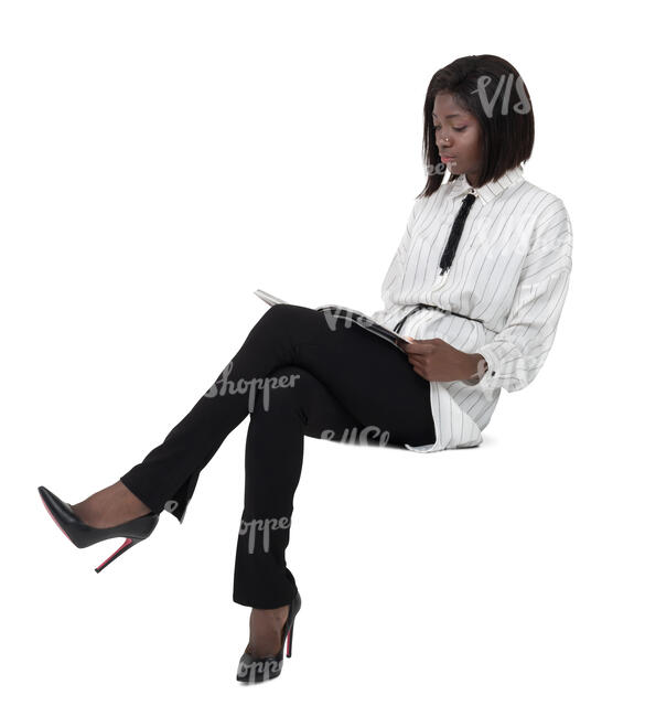 black woman sitting and reading