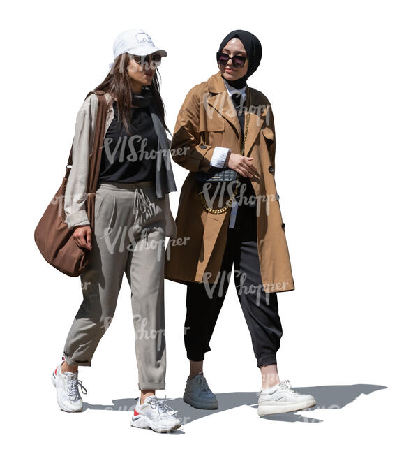 two women walking and talking